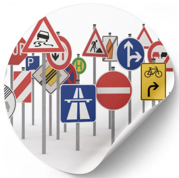 Illustration mit vielen verschiedenen Verkehrszeichen, darunter Stoppschild, Einfahrt verboten, Autobahn, Baustelle und Fahrradweg
